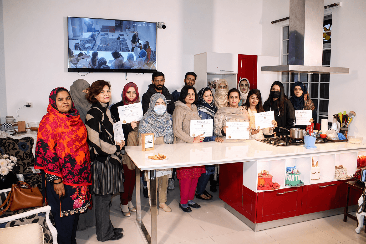 Students completing hands-on cooking exercises at SB Kitchens